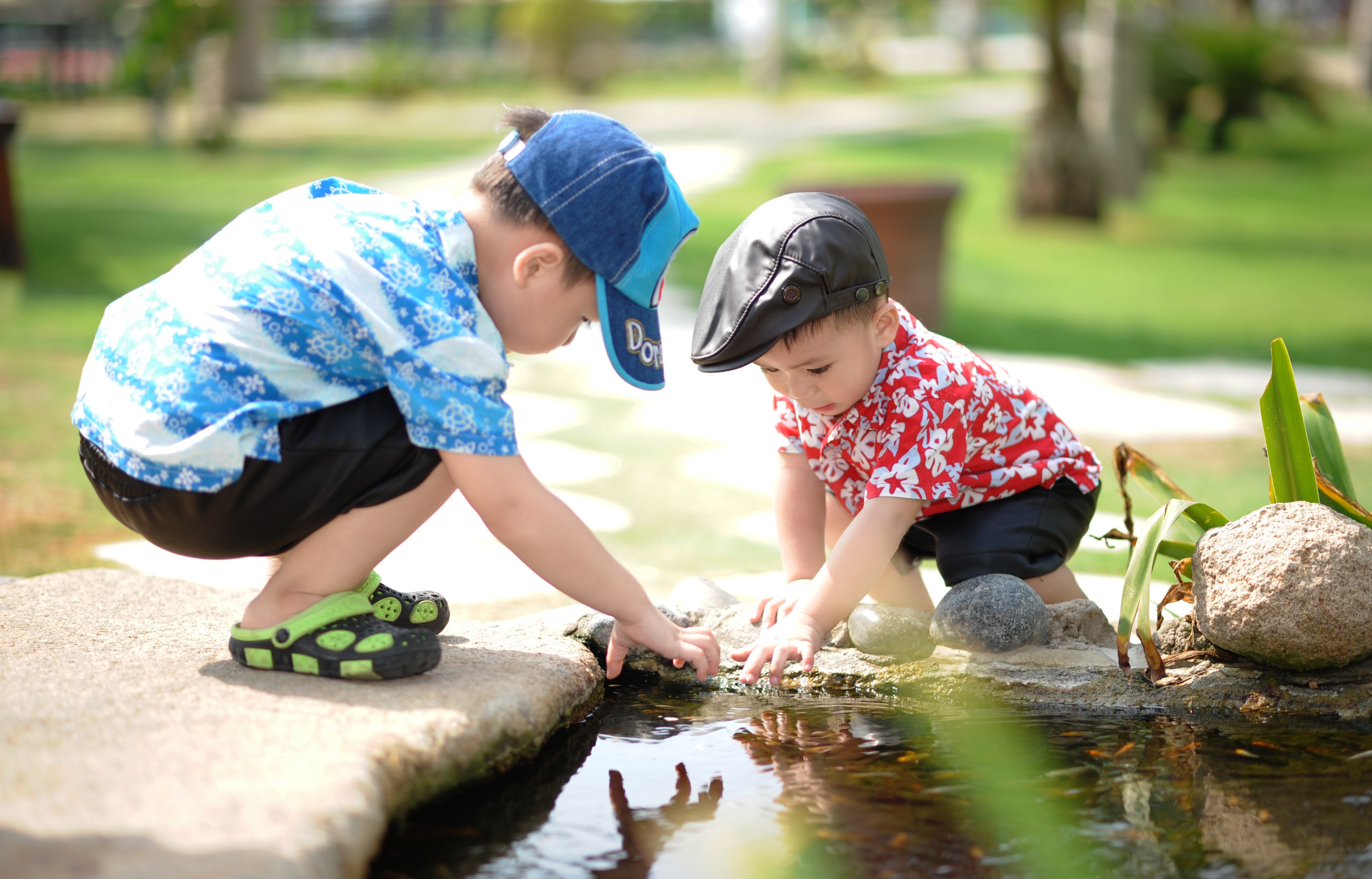 Two boys playing in a pound