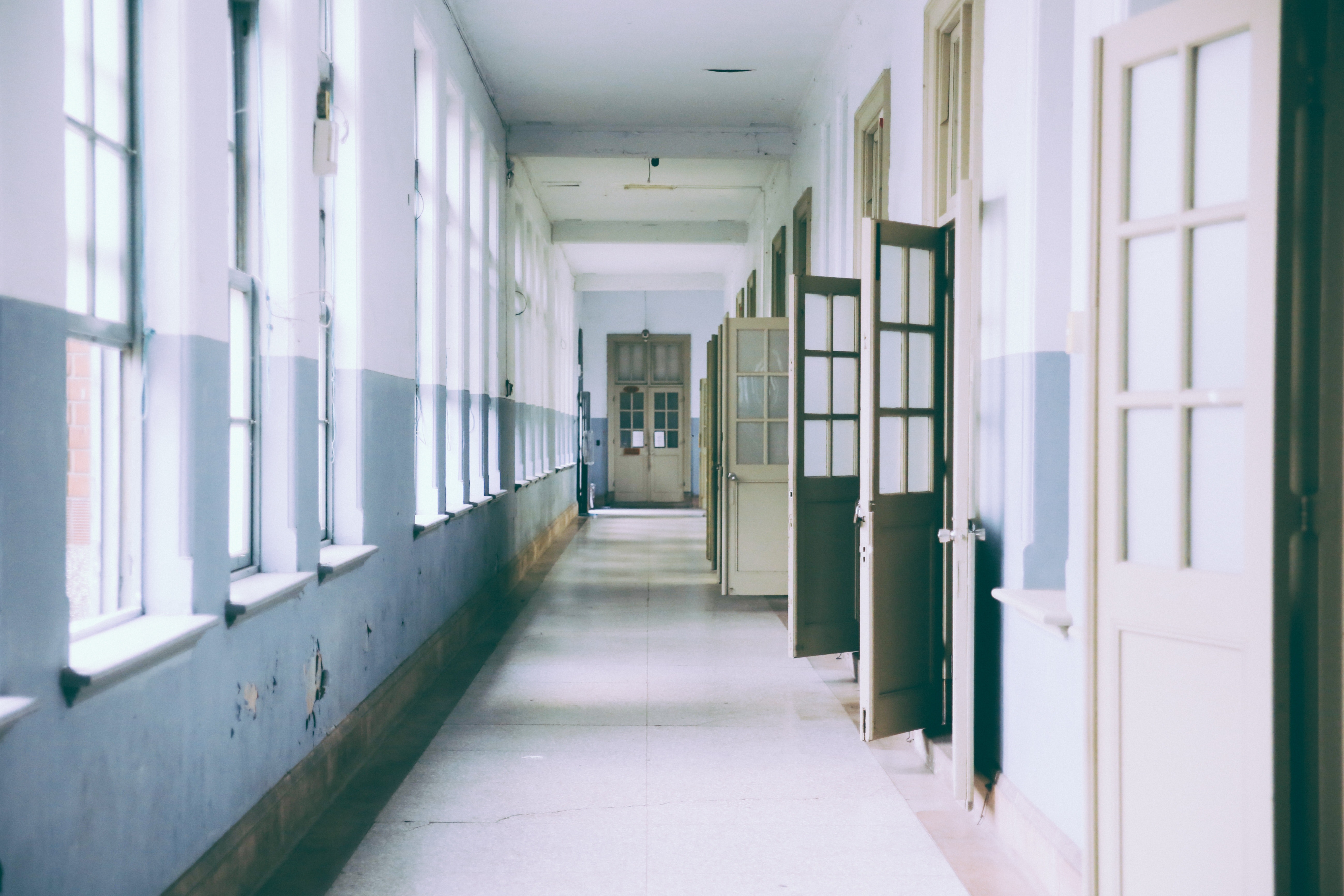 Long corridor with open doors