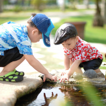 Two boys playing in a pound