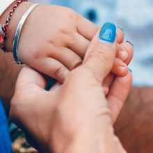 Man, woman and baby hands